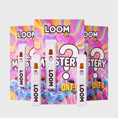 Loom DNT-9 Vape Mystery Bundle, mehrere Vapes vor den Packungen